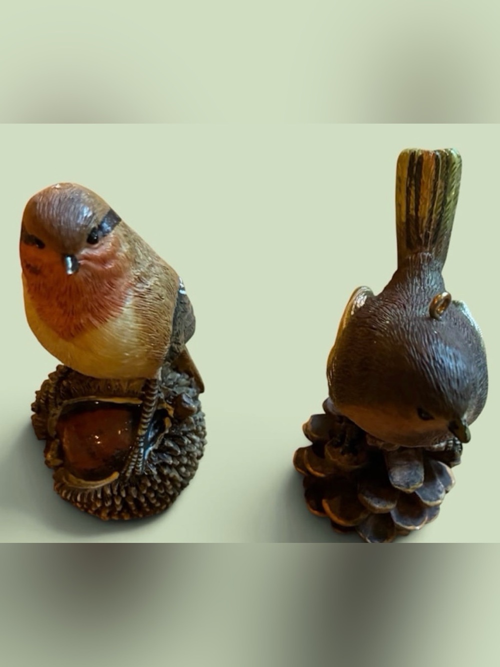 Two composite bird figurine ornaments or tabletop